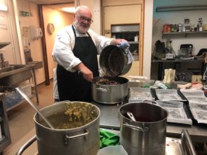 Chef Alan preparing meals for the homeless