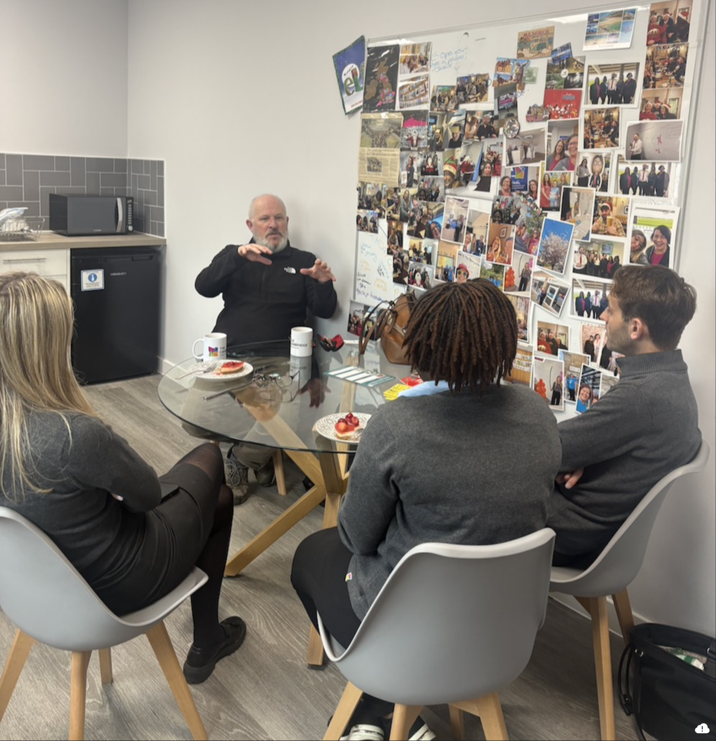 Matt talking to CBS staff in their kitchen