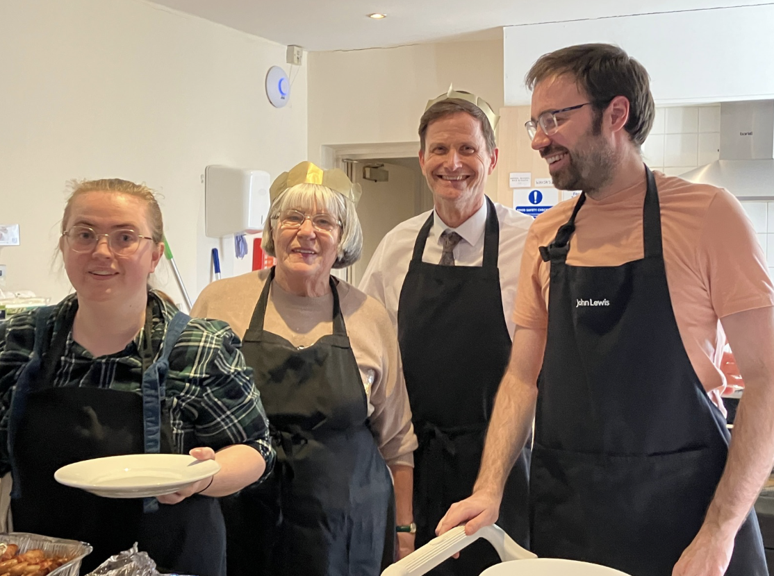 Three volunteers and Barry prepare Christmas dinner at Crossways